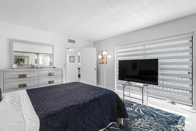 bedroom with a textured ceiling