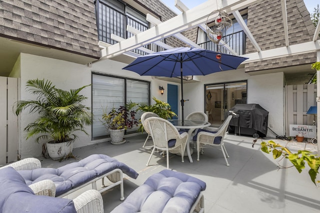 view of patio with a balcony and grilling area