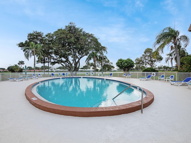 view of pool featuring a patio area