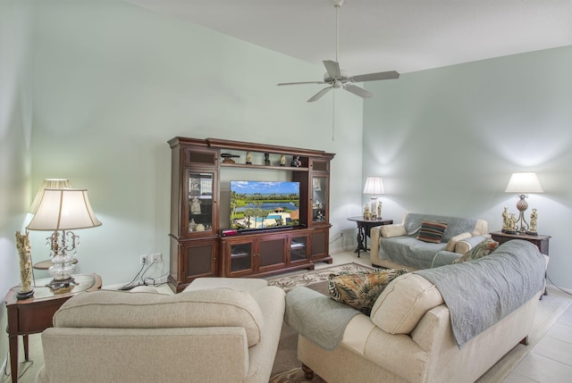 living room featuring ceiling fan and high vaulted ceiling