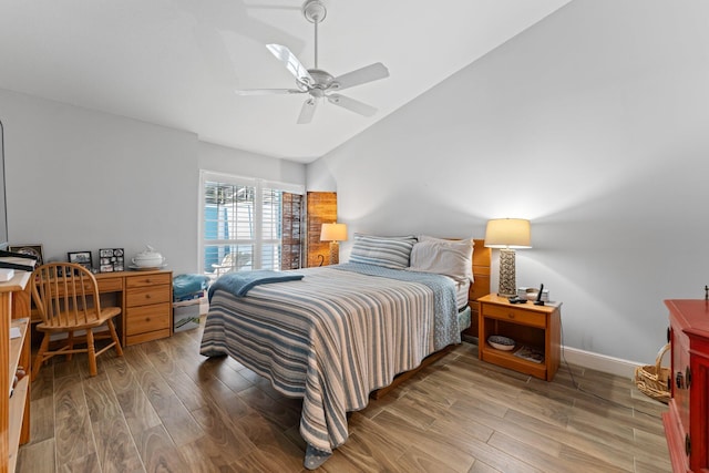 bedroom with ceiling fan and wood-type flooring