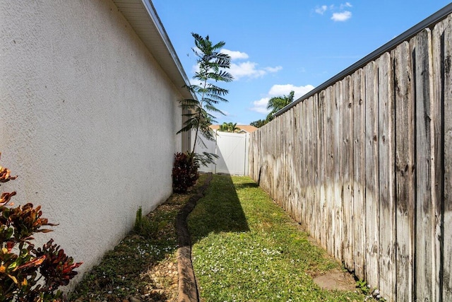 view of property exterior featuring a yard