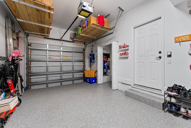 garage featuring a garage door opener