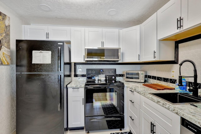 kitchen with white cabinets, a textured ceiling, sink, and black appliances