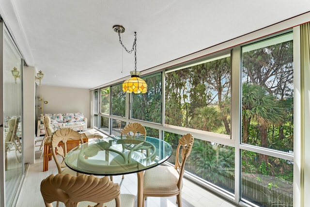 sunroom featuring plenty of natural light