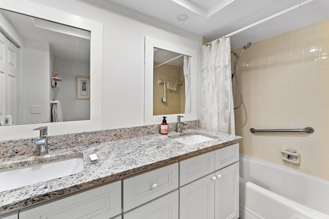 bathroom featuring vanity and shower / tub combo