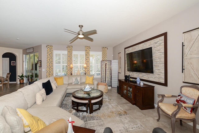 living room featuring ceiling fan