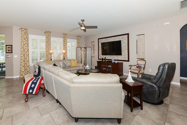 living room with ceiling fan