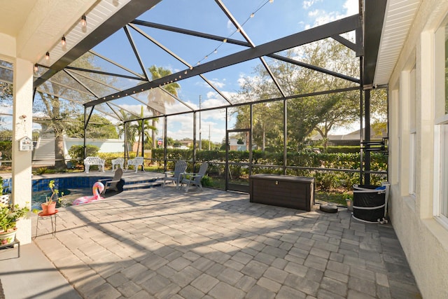 view of patio / terrace with a lanai