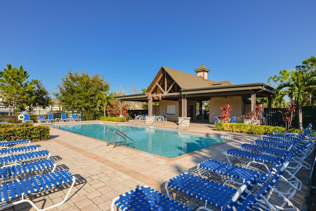 view of pool featuring a patio