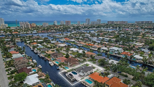 birds eye view of property featuring a water view