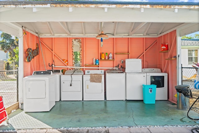 laundry room with washer and clothes dryer and a wealth of natural light