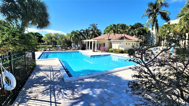 view of pool featuring a patio