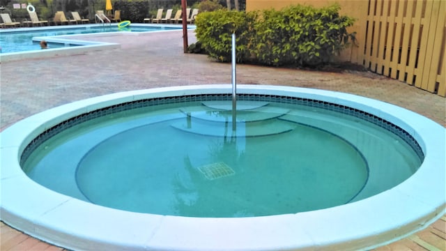 view of pool featuring a patio area