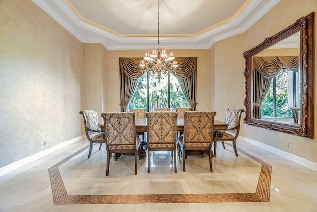 dining area with a notable chandelier, ornamental molding, and a wealth of natural light