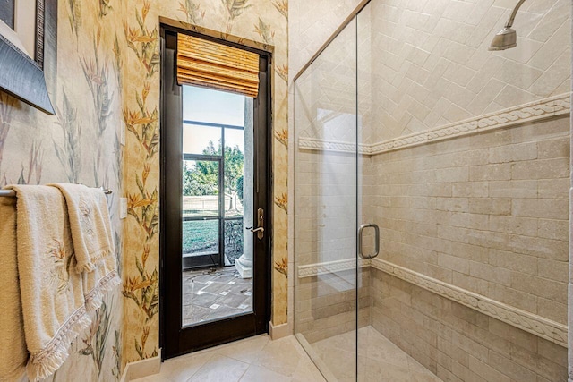 bathroom featuring tile patterned floors and walk in shower