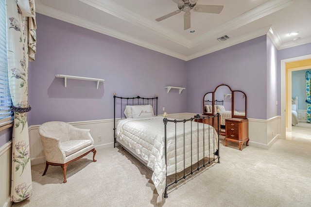 bedroom featuring ceiling fan, carpet floors, and ornamental molding