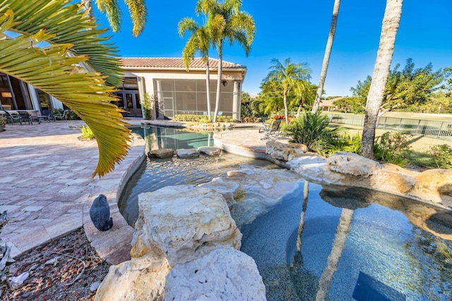 view of yard with a sunroom