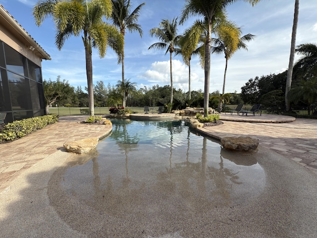 view of swimming pool featuring a patio