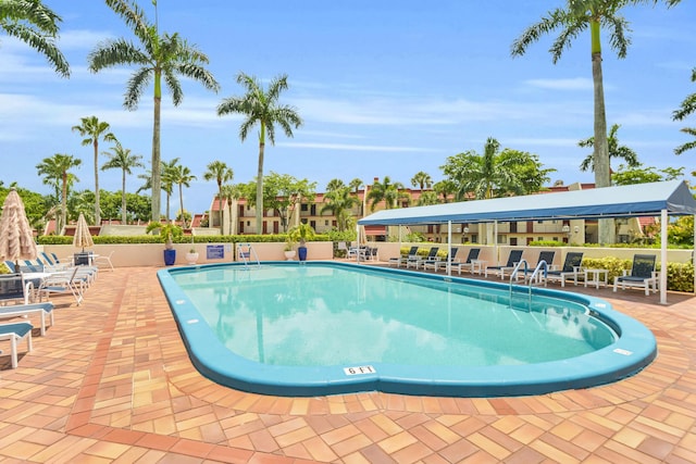 view of swimming pool featuring a patio