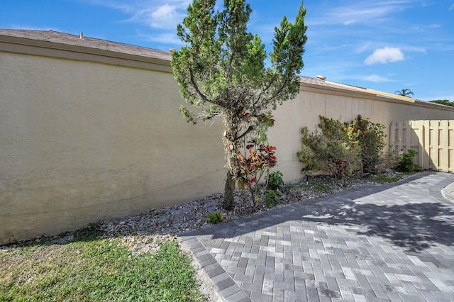 view of home's exterior with a patio