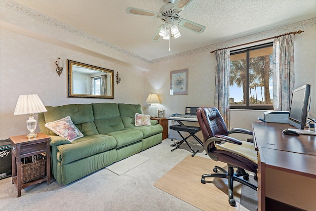 office with carpet, ceiling fan, and a textured ceiling