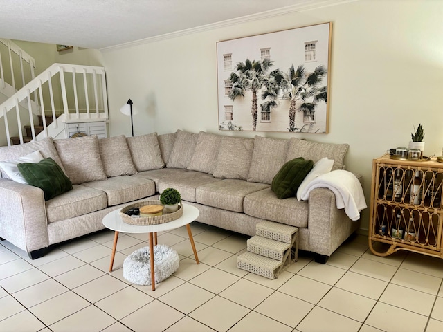 living room with tile patterned floors and crown molding