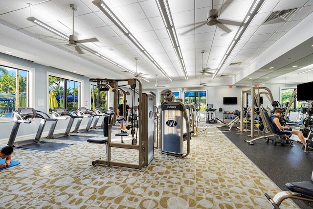 workout area featuring ceiling fan