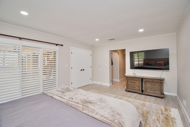 bedroom featuring light hardwood / wood-style flooring