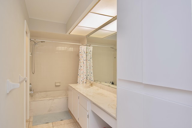 bathroom with tile patterned floors, vanity, and shower / tub combo with curtain