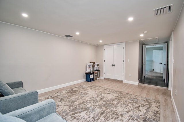 sitting room with light wood-type flooring