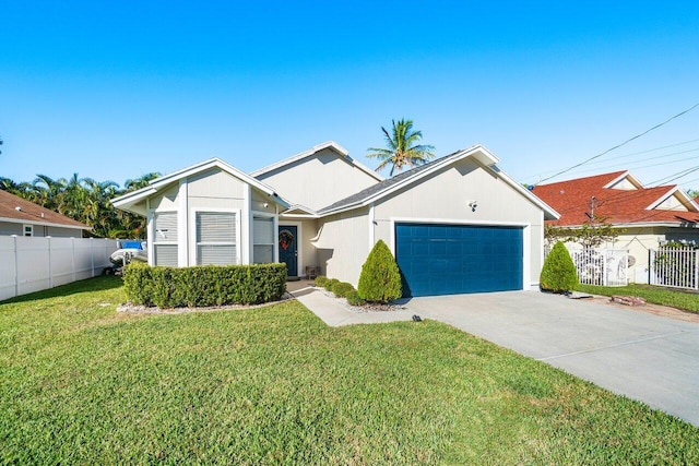 view of front facade with a garage and a front lawn