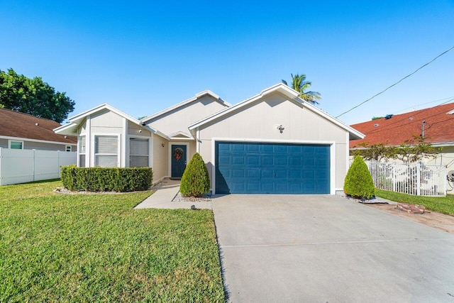 ranch-style house with a front yard and a garage