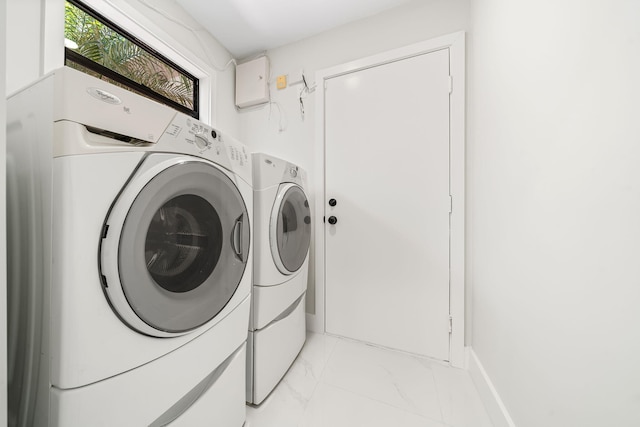 laundry room with washer and dryer