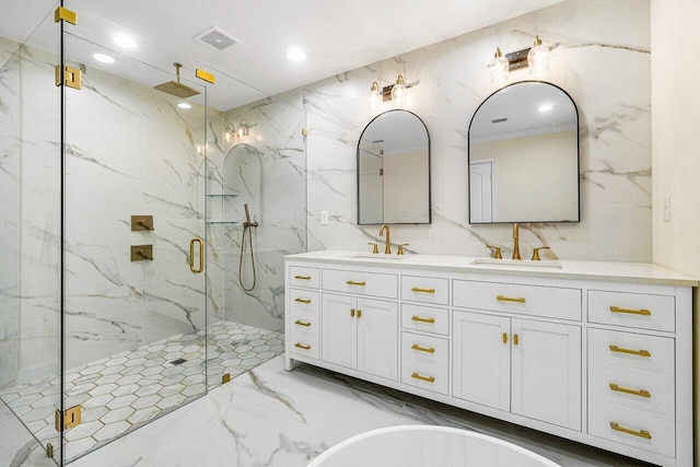 bathroom featuring vanity, tile walls, and walk in shower