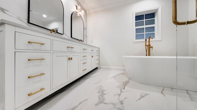 bathroom featuring a washtub, ornamental molding, and vanity