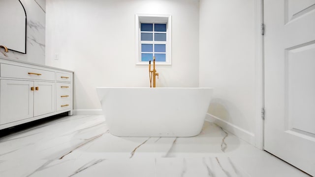 bathroom featuring vanity and a bathing tub