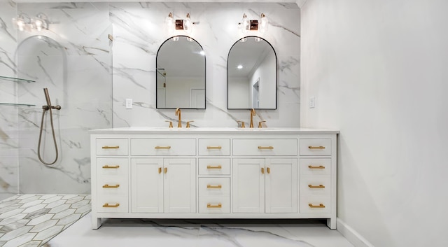 bathroom featuring a shower and vanity