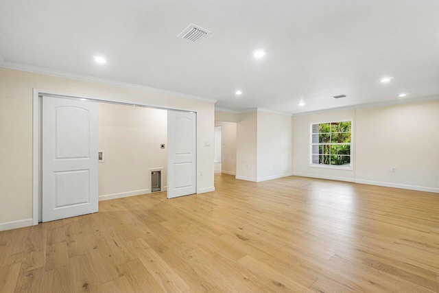 interior space featuring light hardwood / wood-style flooring and ornamental molding