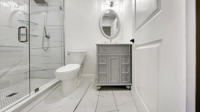 bathroom with a shower with door, vanity, and toilet