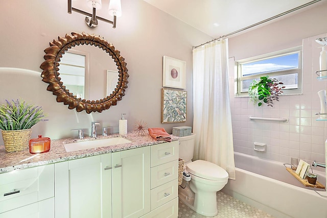 full bathroom featuring tile patterned flooring, vanity, toilet, and shower / bathtub combination with curtain