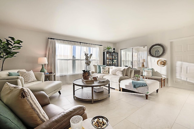 living room with light tile patterned floors