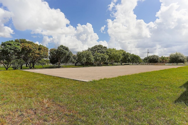 surrounding community featuring a rural view and a yard