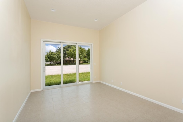 view of tiled spare room