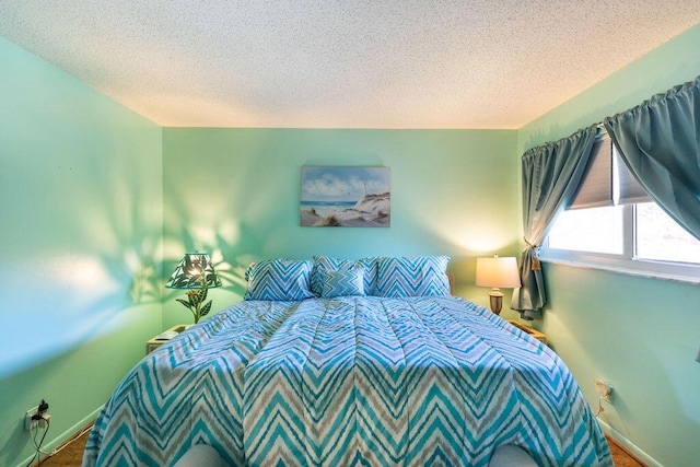 bedroom featuring a textured ceiling