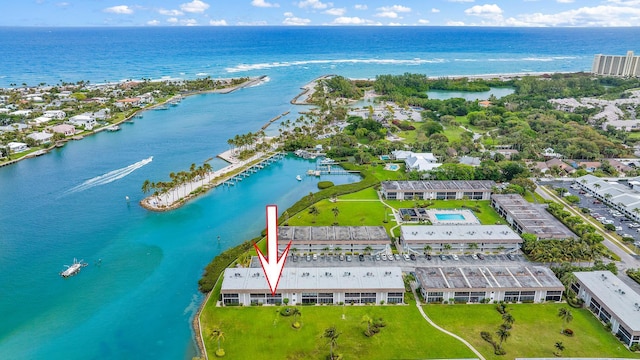 birds eye view of property featuring a water view