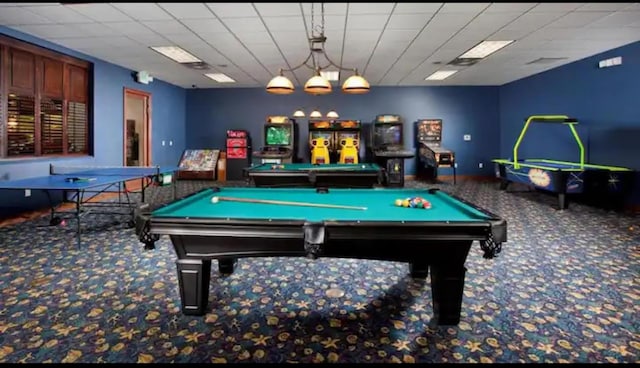 rec room with carpet flooring, a paneled ceiling, and pool table