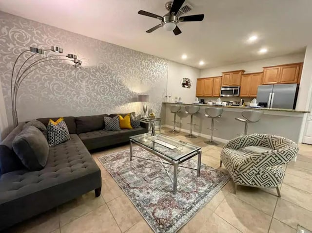 living room featuring ceiling fan