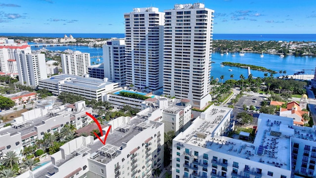 birds eye view of property featuring a water view