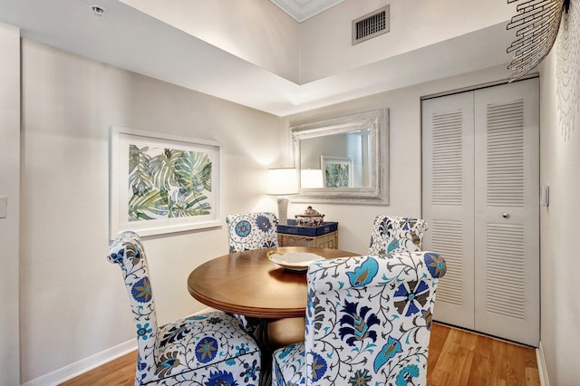 dining room with light hardwood / wood-style flooring